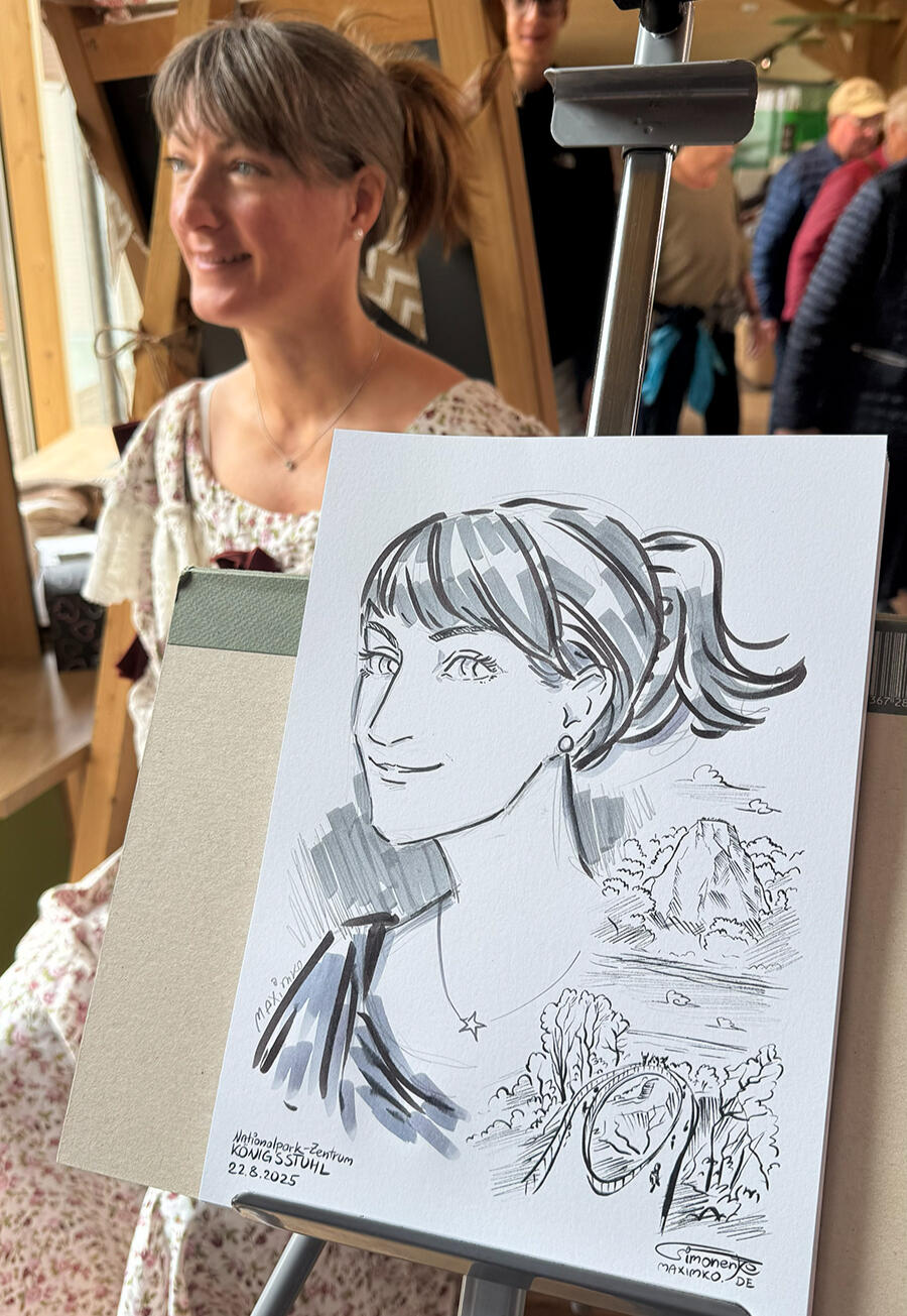 Drawing live portraits on paper with background matching your event style